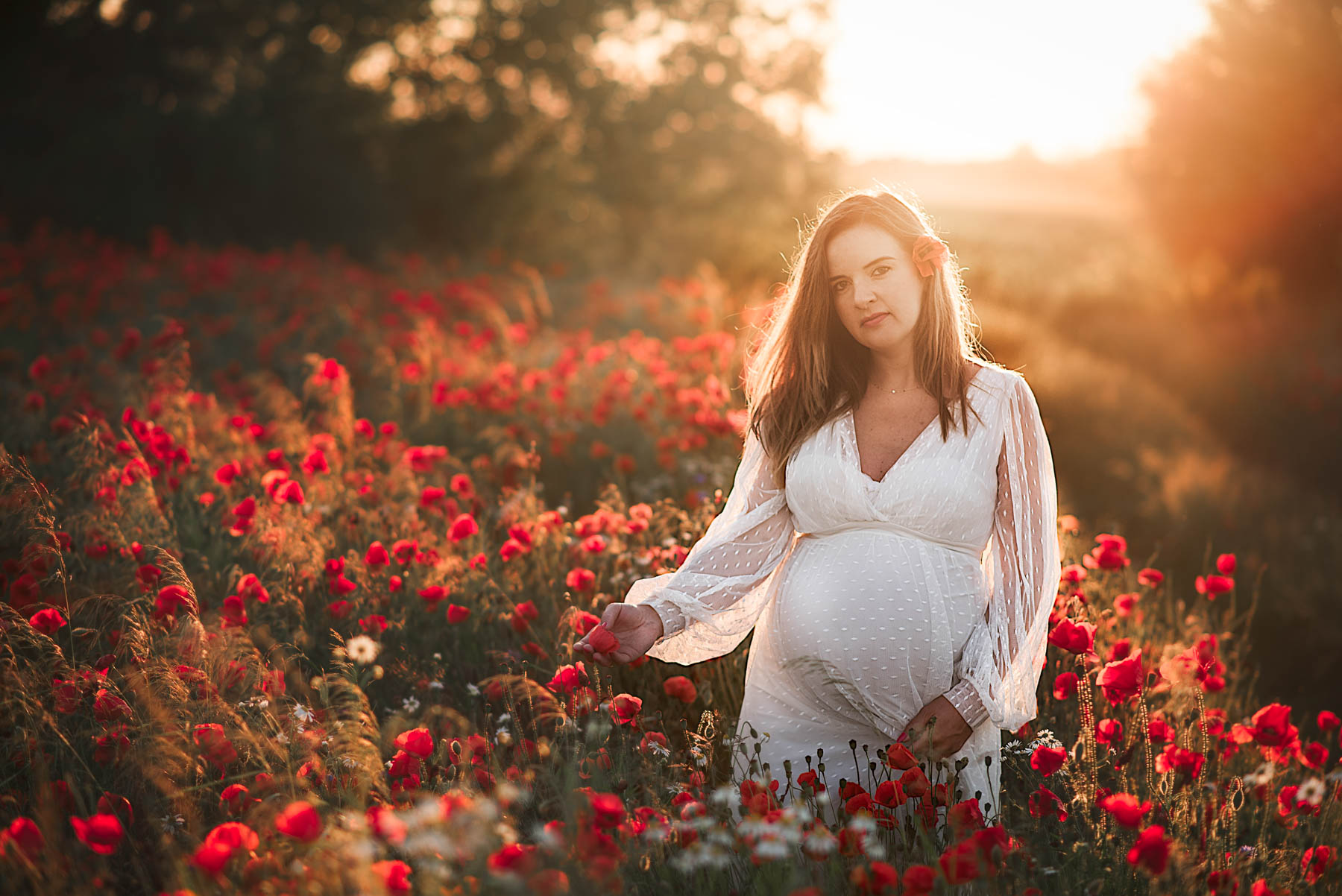 Sesja ciążowa w kwiatach